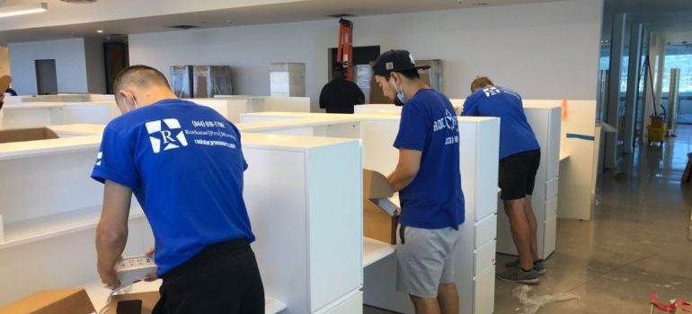 commercial movers Austin packing a corporate office