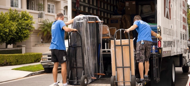 Movers Burbank lifting items into a truck